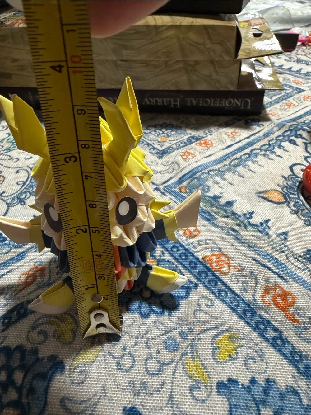Preloved: 3D origami figure crafted using modular paper folding techniques.